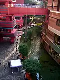 A narrow pool runs the length of Canal City