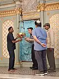 Lighting a candle in the synagogue, 2026