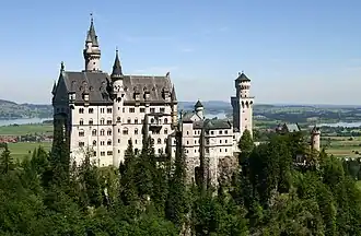 Image 12 Schloss Neuschwanstein Photo credit: Softeis Schloss Neuschwanstein ("new swan stone castle") in southwest Bavaria is one of Germany's most popular tourist destinations. Construction was started by King Ludwig II and took 17 years. After his death in 1886, the castle was opened to the public. During World War II, many valuable items (all stolen) were stored at the castle, destined for Adolf Hitler's personal collection.