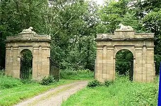 Culzean Castle. Cat Gates – the original inner entrance, with Coade stone cats surmounting the pillars. (See §&nbsp;Examples: Culzean Castle.)