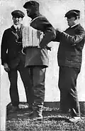 Charles Rolls (centre), 1910