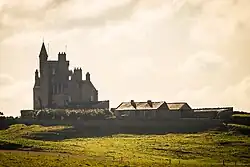 Classiebawn Castle set against a sunset