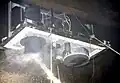 Following successful three hour fire endurance test, application of hose stream