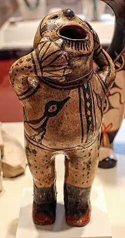 Humanoid ceramic figurine produced by the people of the Cochiti pueblo.