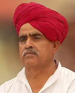 Col Bainsla in his white kurta and red turban