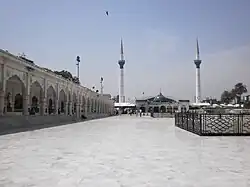 The shrine is fronted by a large courtyard for devotees to gather every Thursday night, as well as on other festival nights.