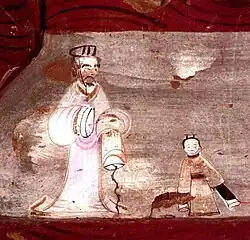 A child wearing yuanlingpao and a gentleman, late Western Han Dynasty.