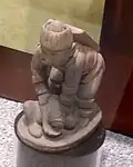 Reproduction of the "Conquering Warrior" effigy pipe from Spiro