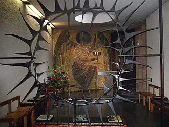 Angel of Agony mosaic by Steven Sykes, seen through Basil Spence's Crown of Thorns screen.