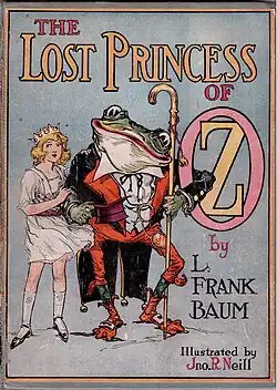 Dorothy (left) with a Frog Man under/around the text "The Lost Princess of Oz"
