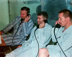 The crew speaking with President Nixon shortly after their return