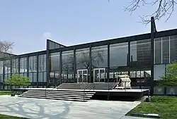The southern facade of the building, containing steps that lead up to the main entrance