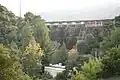 Crystal Springs Dam and Crystal Springs Pump Station, viewed from downstream