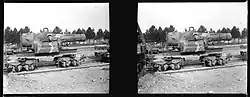 Stereo view of a mle 1889 being transported to the front.