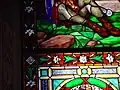Ulisse De Matteis, detail of a stained-glass window depicting the Resurrection of Christ created for the Vinaccessi Chapel in the Cathedral of Prato, 1874. The inscription on the rock reads: Sta Francini e Co. U.D.M. N. Bruschi | U. De Matteis disegnò e dipinse | FIRENZE 1874.