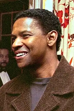 A middle aged man smiling