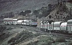 Two trains meet in a valley
