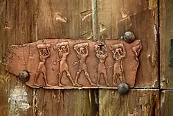 Detail of an embossed scene on bronze plate showing armed men carrying booty. From a Balawat gate, Iraq, 859–824 BCE. Ancient Orient Museum, Istanbul
