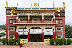 Monastic complex with prayer flags in a hill town