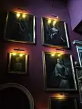 Dick family portraits inside the House