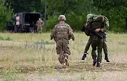 Members of the regiment training with dogs.