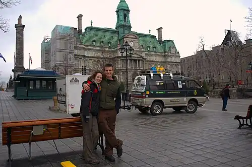 Tyson Jerry and Cloe Whittaker of the Driven to Sustain team outside Montreal City Hall during their cross-continental sustainability campaign.
