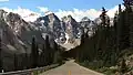 Road to Moraine Lake, yellow centerline aimed at Tonsa Peak