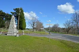 Looking towards the Avenue of Honour at Drummond, with the war memorial visible on the left