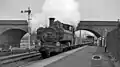 Down goods train passing under the LMR viaduct in 1962
