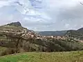 Eğrigöz in springtime. The two hills are visible on either side of the image.
