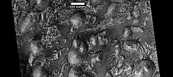 Top part of previous images, as seen by HiRISE Note: dark parts are basalt sand.