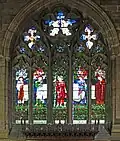 The east window in apse, by Burne-Jones/Morris Co. depicting Jesus as the Tree of Life, surrounded by the evangelists.