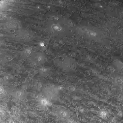 An image of Edfu Facula and Khepri crater that are within Galileo Regio. This photograph was taken by Voyager 2 in July 1979.