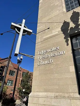 Illuminated cross on the corner of Bryn Mawr Ave. at Kenmore Ave. in Chicago, Illinois