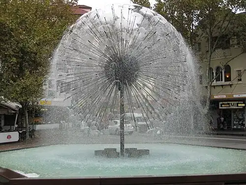 The El Alamein Fountain (1959–1961) in Sydney, designed by Robert Woodward, was the first "dandelion" fountain