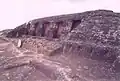 Niches cut in the rock. This is where the priests lived or stored ceremonial items.