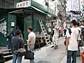 The closed and the still-operating dai pai dongs on the street in 2005