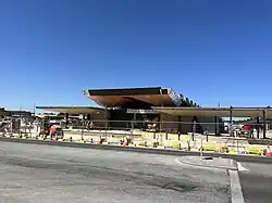 Station under construction but nearly finished, viewed from a street