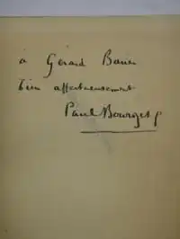 Handwritten note on yellowed paper.