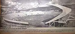 Black and white photograph of a stadium.