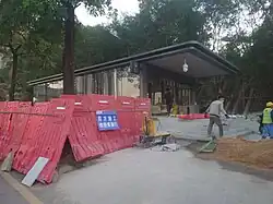 Exit C under construction after station opening (21 December 2022)