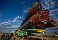 The Soyuz TMA-01M spacecraft is rolled out by train to the launch pad.