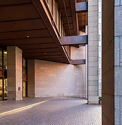 The 43rd Street entrance. The entrance-level facade, at left, is recessed from the upper floors to provide space for a driveway.