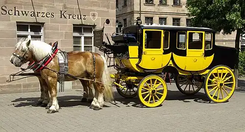 Pair hitched to a post coach