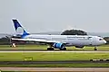 An XL Airways livery with Garuda Indonesia titles having just returned from a Hajj services.