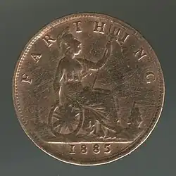 A copper coin with Britannia on it