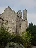 South west crow stepped gable. South wing with lateral chimney stack.