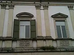 Detail of the windows on the piano nobile of Palazzo Civena Trissino.