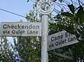 Perplexing signpost at Hookend