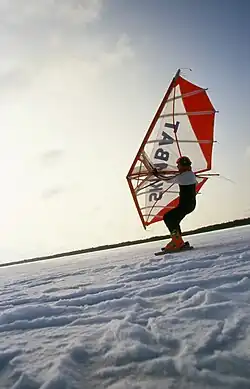 Image of the Finn Sami Tuurna with one of his first prototypes of SKIMBAT.